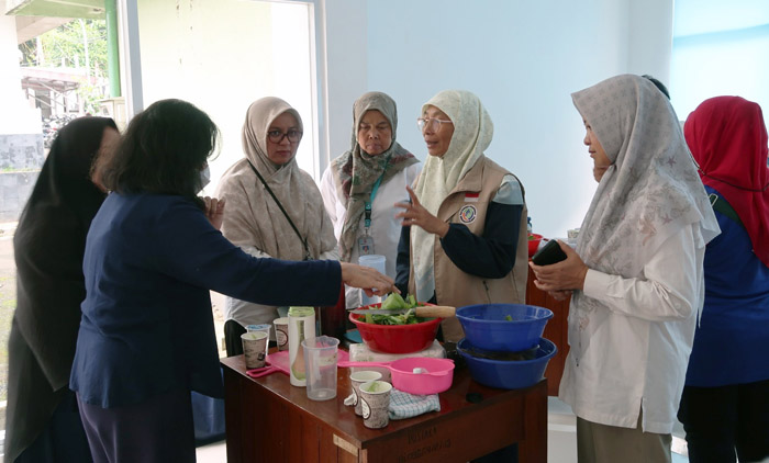 The Agricultural Library Support Indonesian Farmers to Attain Food Self-sufficiency
